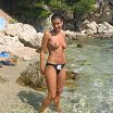 Topless beach girl