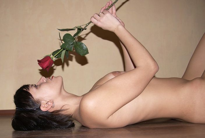 Hot teen simply posing with roses