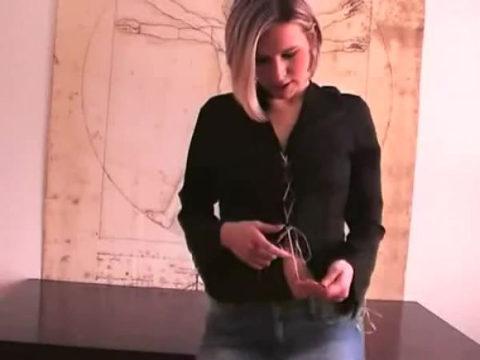 Girl strips to a sexy black teddy