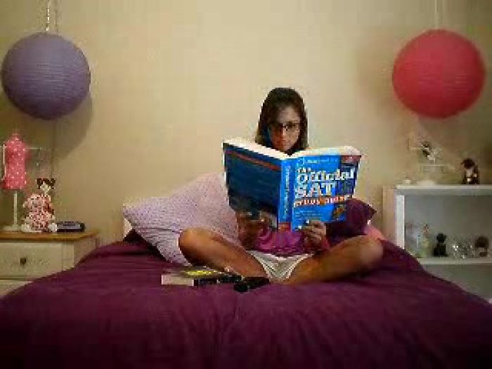 Alexis Tilelli Reading A Book